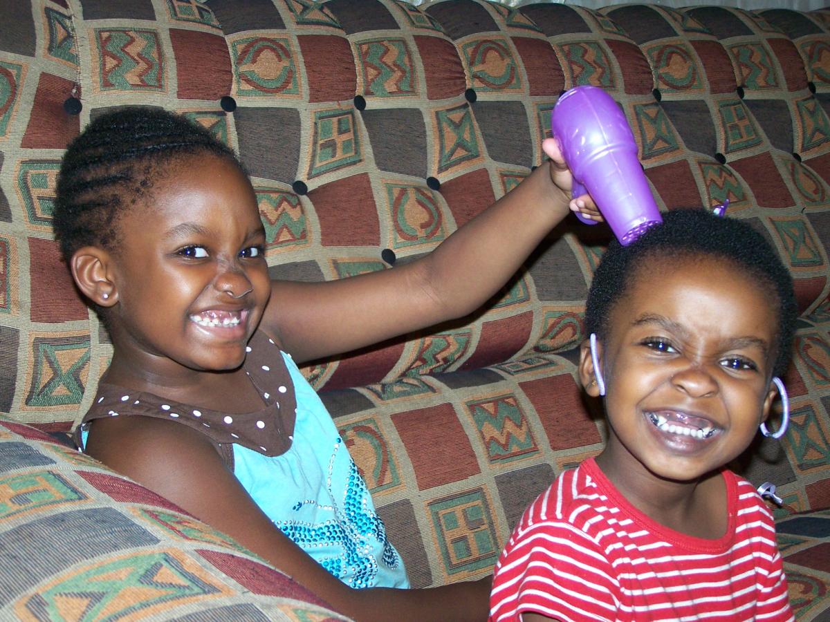 Top: RCZDD staff doing training Above: Essie & Lizzie