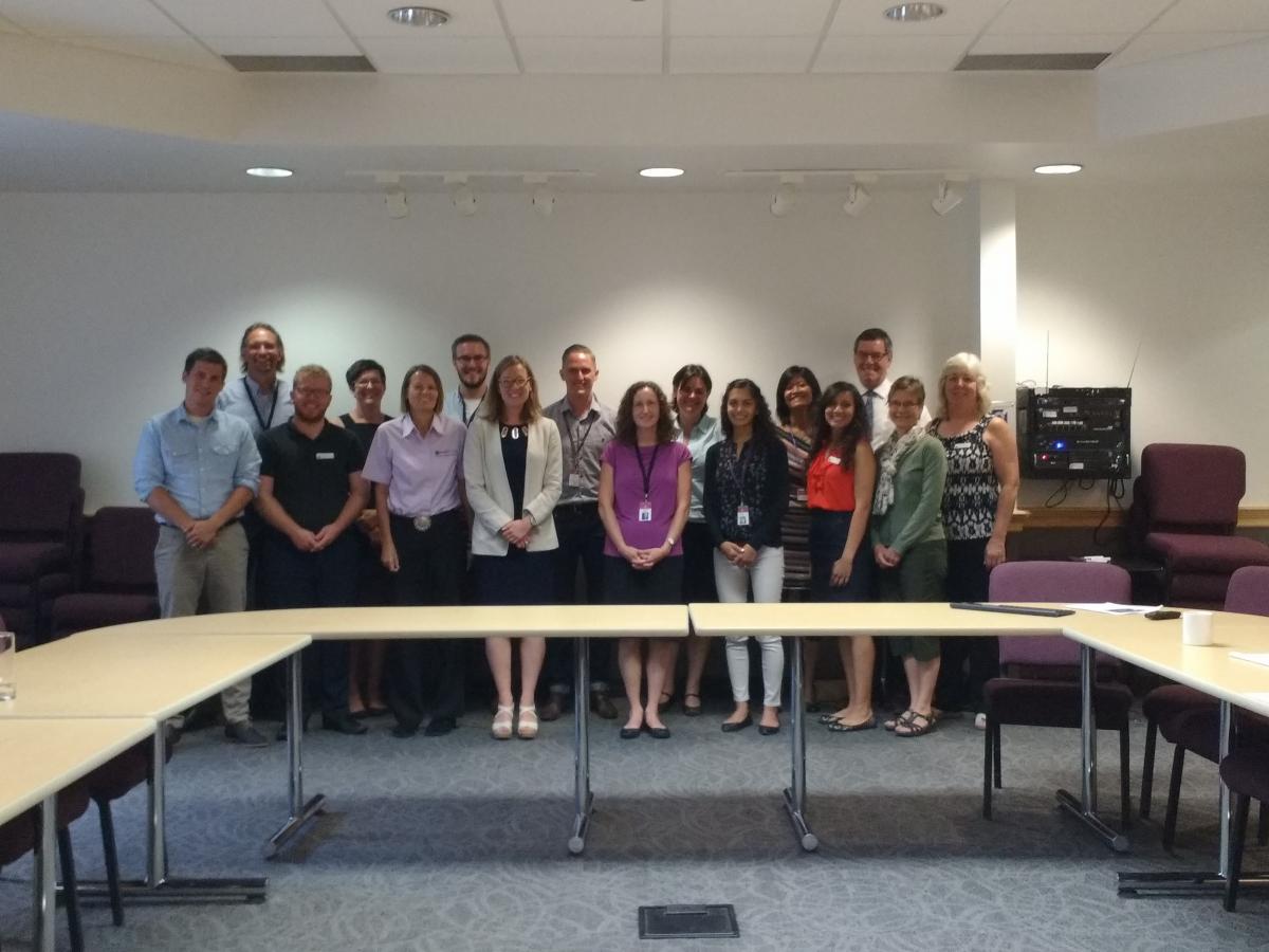 Ms. Gould posing with World Renew staff.