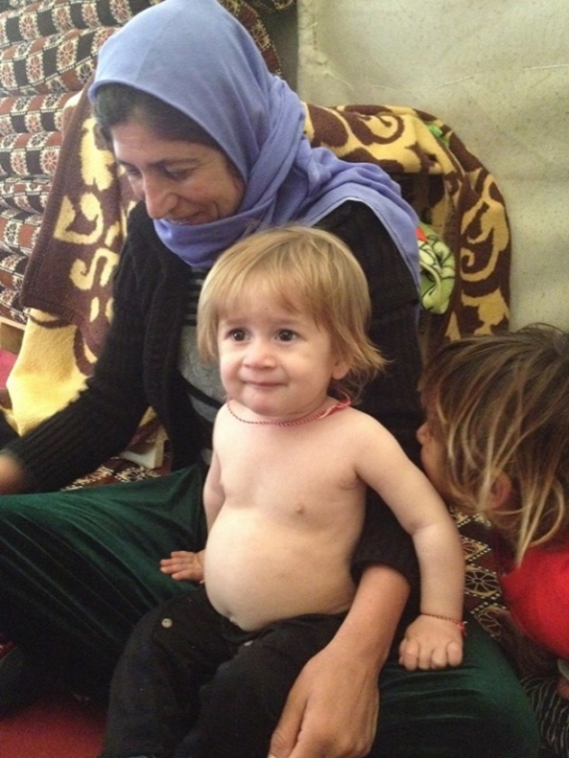 Roza with her family.