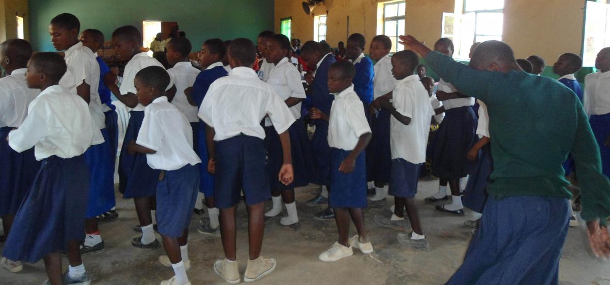 The students dancing & singing at the early Christmas party