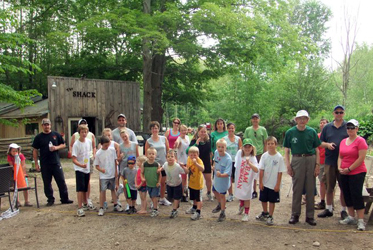 Gerrit VanderPloeg (green shirt), a long-time World Renew Disaster Response Services volunteer, stands at the starting line with his children and grandchildren.