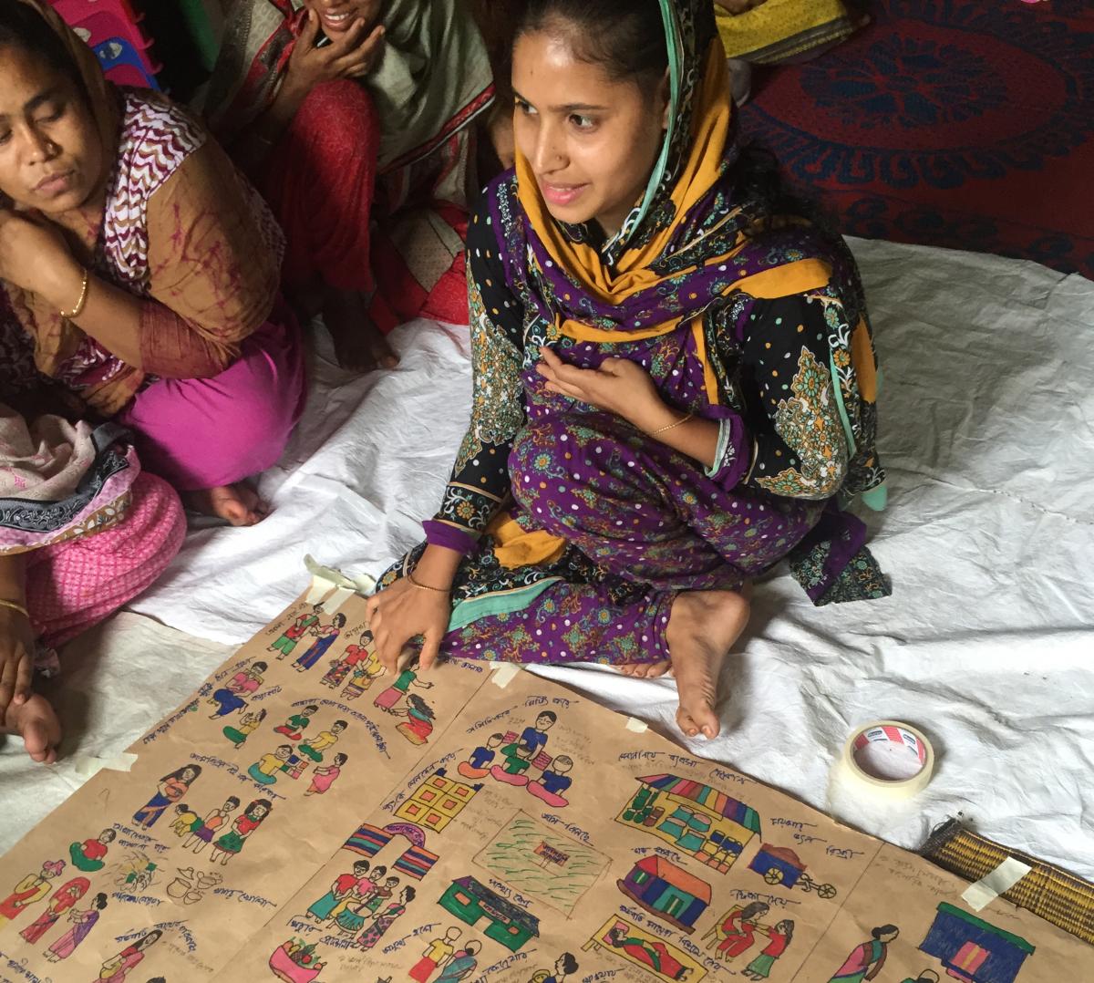 Beauty tells the story of change in her slum community, using pictures she painted herself.