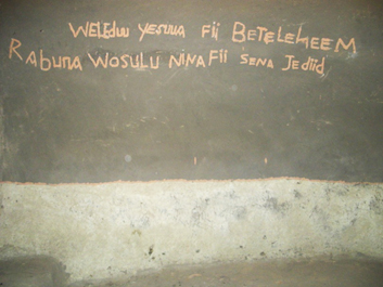 Hope through Jesus Christ, Yei 2015; an inscription on the wall of a small church in South Sudan says "Jesus came out of Bethlehem, and now God has reached us."