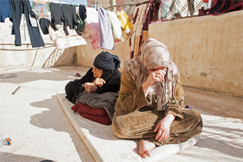 Photos: Five Syrian families and their children live in a small, 3-bedroom apartment in Irbid, Jordan, where they await registration for international assistance. Photo Credit: Eleanor Bentall, Tearfund.