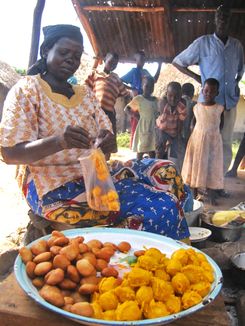 TOP: Members of St.Barnabus VSL group, ABOVE: A group member who has benefited by a loan