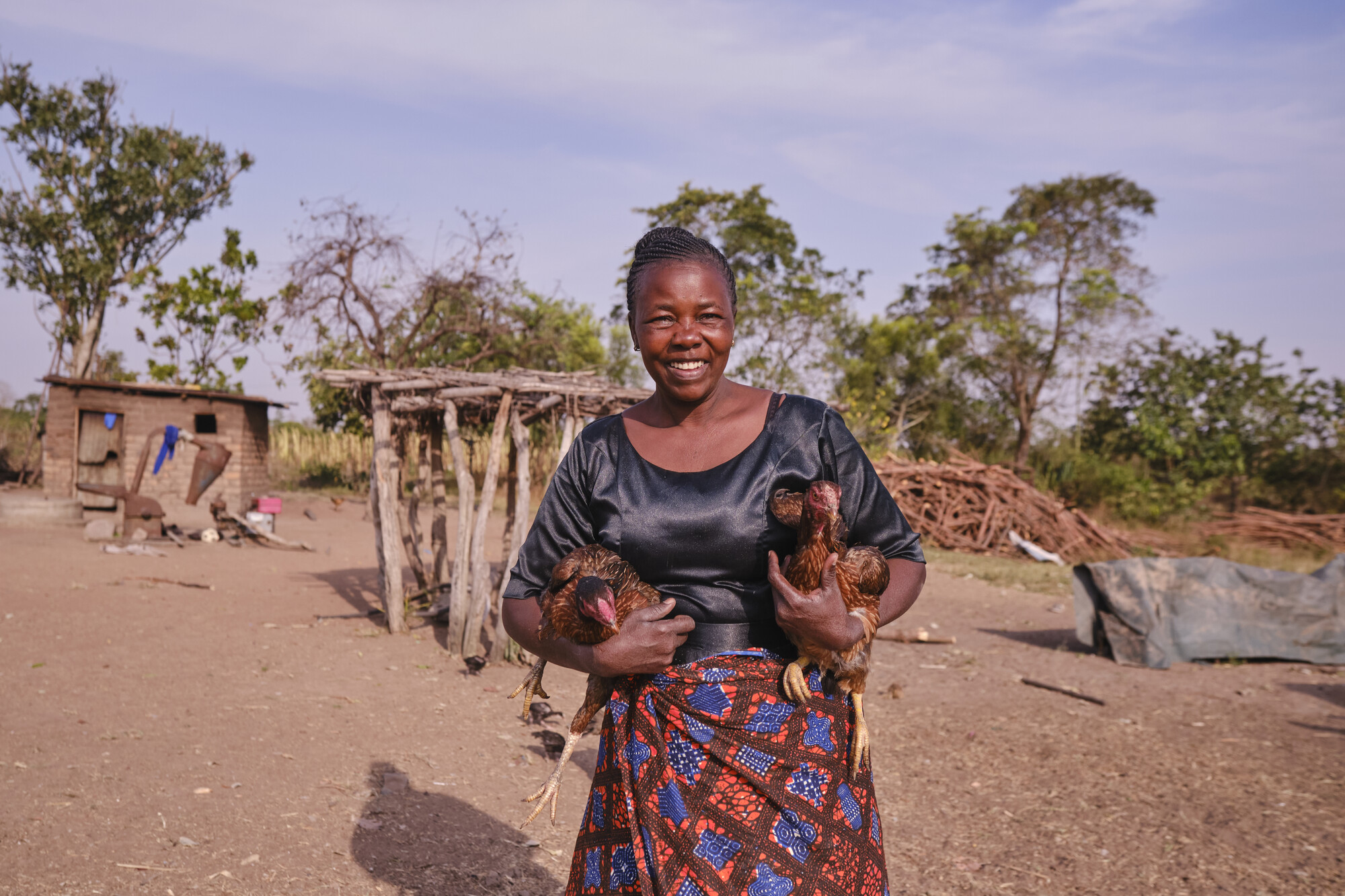 Woman holds chickens